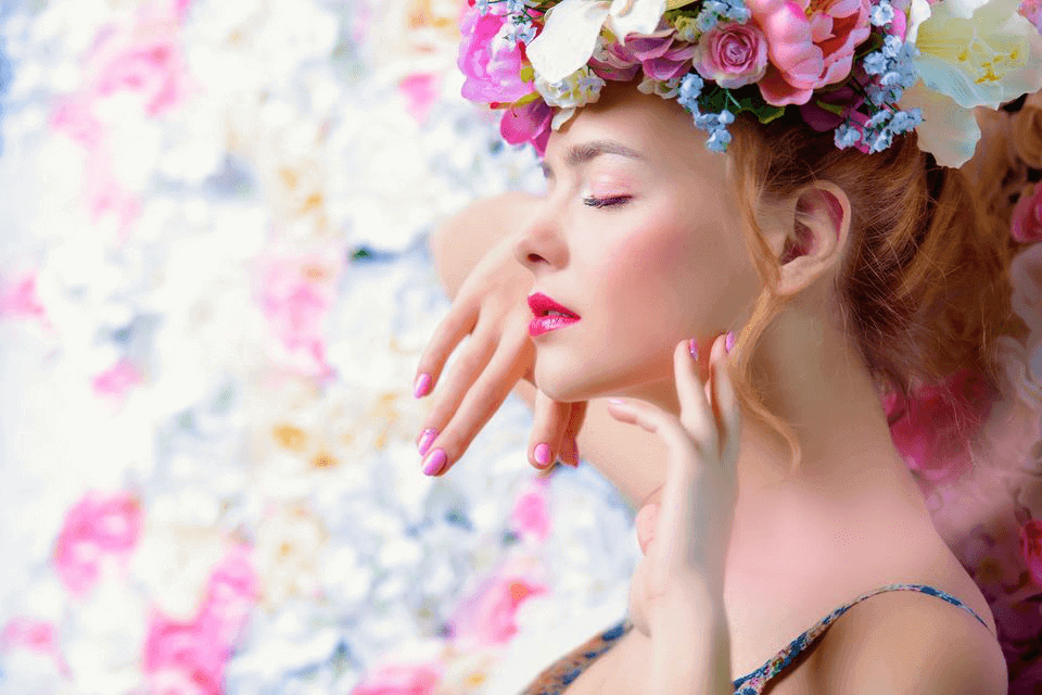 Female experiencing fragrances for emotional connection in scent branding